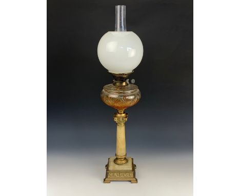 A Victorian brass and alabaster columnar oil lamp, 74 cm