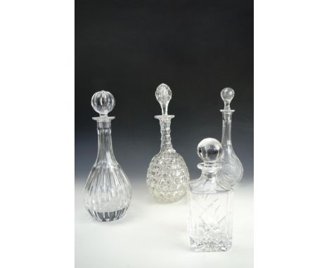 A Victorian heavy hobnail-cut decanter and three others, including a Carlisle Golf Club spirit decanter