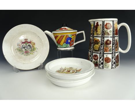 A Past Times teapot, a flower jug, two commemorative bowls and a plate