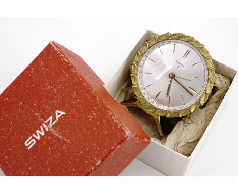 A late 1960s Swiza bedside / desk alarm clock, in original carton