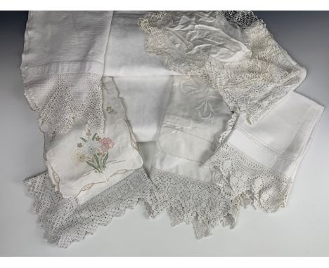 Antique domestic table linens, including damask table cloths, lace trimmed tea table and tray cloths, an Art Nouveau tea tabl