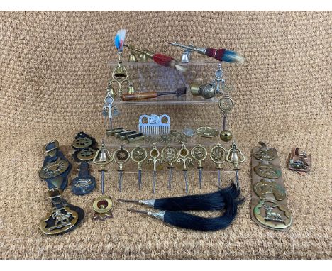 A large collection of 19th Century and later horse brasses, bells, plumes, jinglers, and other harness decorations, together 