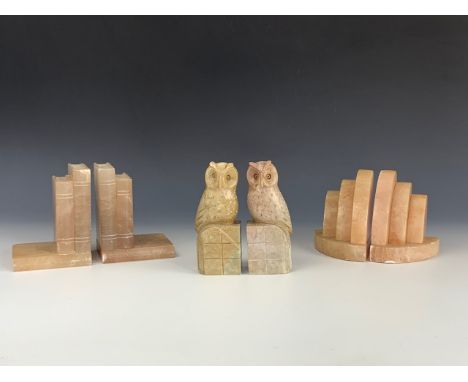 A pair of vintage Art Deco alabaster book ends, another pair of alabaster book ends and a carved soapstone pair in the form o