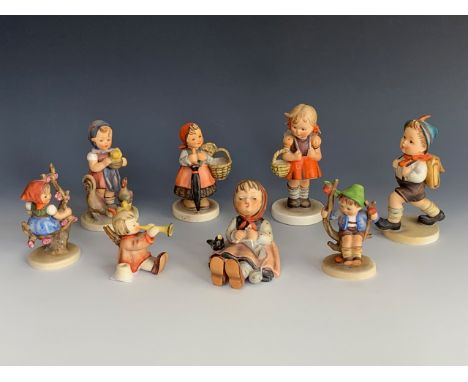 Eight various Hummel figurines including Feeding Time