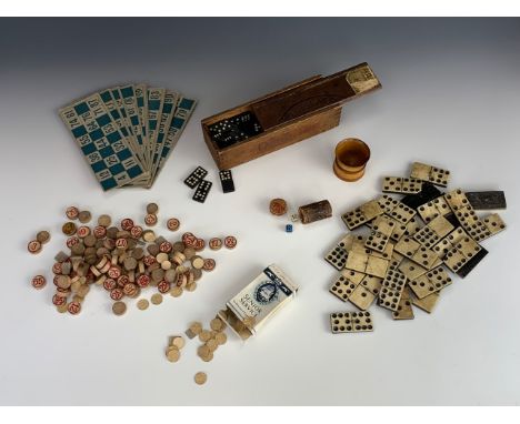 Sundry vintage games including a treen dice shaker and a hollowed-out wine bottle cork containing dice