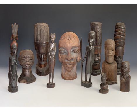 Sundry African wooden carvings together with a ceramic bust, tallest 33 cm