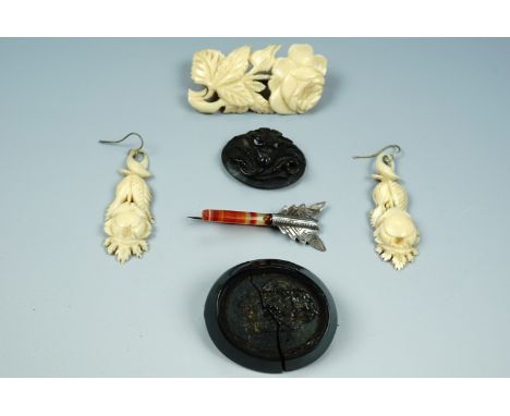 Victorian jewellery, including a jet brooch, ivory ear pendants and a brooch, together with a partial agate arrow brooch, jet