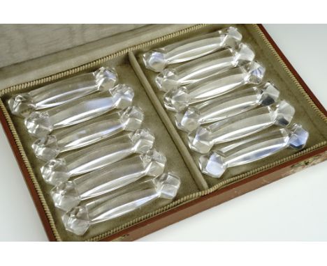 A vintage cased set of cut glass knife rests, second quarter 20th Century