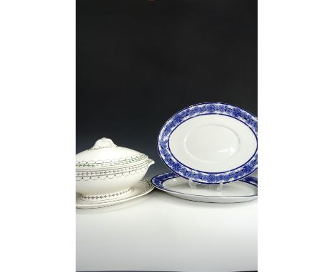 A Minton Fontaine bleau pattern tureen and stand together with two Royal Worcester ashets.