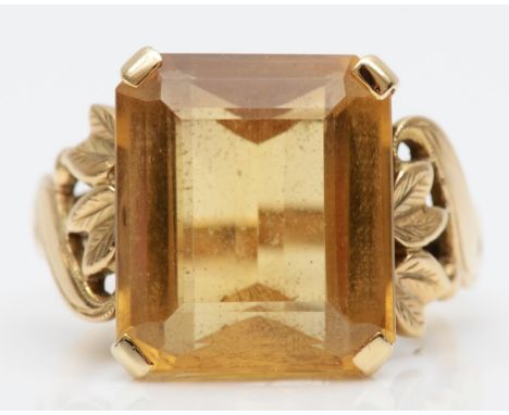 A vintage 9ct gold and citrine dress ring, date letter sized, claw set with a rectangular stone measuring 14 x 12mm, floral s