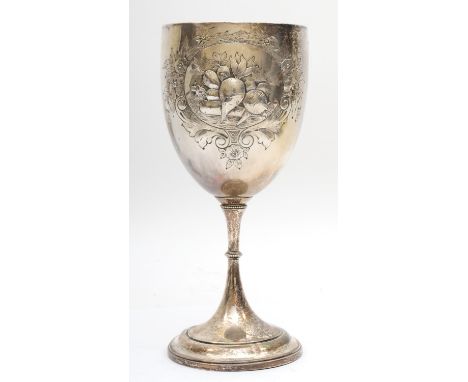 Of Victorian vegetable show interest; a silver presentation trophy cup, Birmingham 1875, embossed and chased with root vegeta