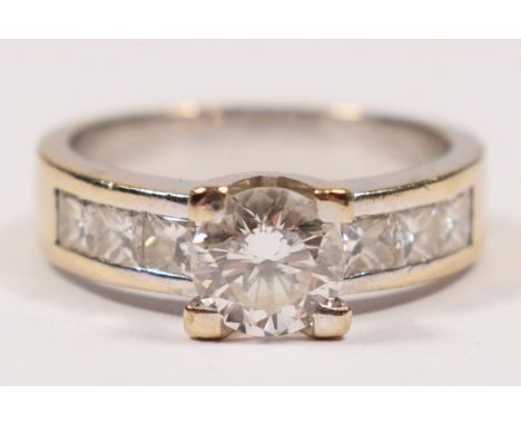 A white gold and brilliant cut diamond single stone ring, tests as 18ct, approximately 0.70cts, colour estimate F/G, clarity 