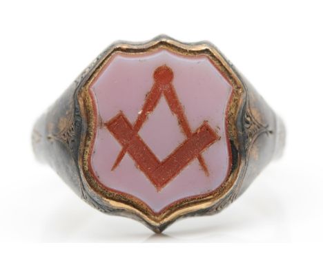 A Victorian gold  and carved sardonyx Masonic signet ring, unmarked, tests 9ct gold, with floral engraved shoulders, U, 5gms 