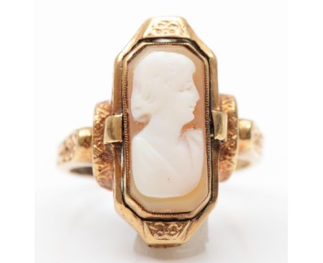 An American 10K gold shell cameo/diamond set onyx panel swivel ring, signed Romany, for Stern &amp; Stern New York, with engr