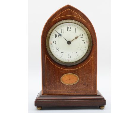An Edwardian inlaid mahogany mantel clock, having convexed enamel dial with arabic numerals with eight day movement, raised o