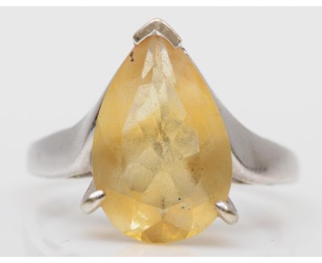 A 9ct white gold single stone citrine ring, claw set with a pear shape stone, 15 x 10mm, N, 3.6gm