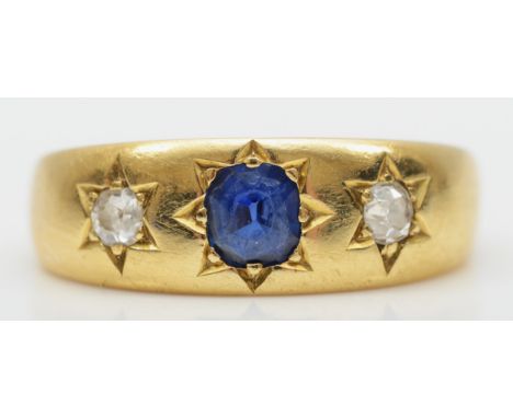 A Victorian 18ct gold sapphire and diamond three stone ring, star gypsy set with old cut stones, N, 5.1gmSlight scratches to 