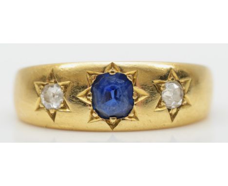 A Victorian 18ct gold sapphire and diamond three stone ring, star gypsy set with old cut stones, N, 5.1gmSlight scratches to 