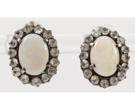 An unmarked gold pair of opal and white sapphire cluster ear rings, 15 x 12mm, 4.5gm 