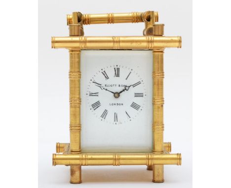 A brass carriage clock, retailed by Elliott &amp; Son London, with stylised bamboo gilt frame, housing an 8 day movement. 9cm