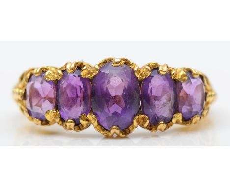 A vintage 9ct gold five stone amethyst ring, fancy claw set with graduated stones, P, 3.9gm 