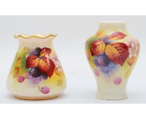 Two Royal Worcester baluster vases, hand painted with still lifes of fruits on a mossy bank, signed K.Blake, puce mark, Reg N