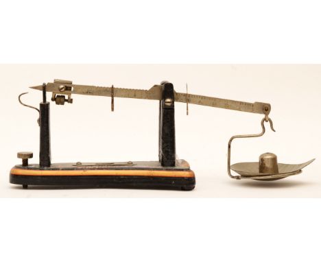 An early 20th century slide scale by Fairbanks of Birmingham, painted cast metal and nickel brass construction, with weight. 