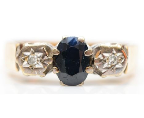 A 9ct gold sapphire and diamond three stone ring, M, 3.2gm 