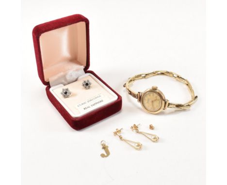 A collection of 9ct gold and 925 silver jewellery. The lot to include a pair of hallmarked 9ct gold, sapphire and CZ stud ear