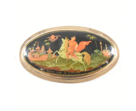 A hallmarked 9ct yellow gold mounted brooch pin. The brooch set with a Russian oval pictorial hand painted plaque depicting a