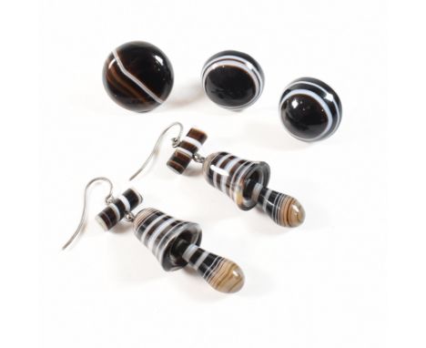 A pair of banded agate pendant earrings and button studs. The lot to include a pair of banded agate pendant earrings with mix
