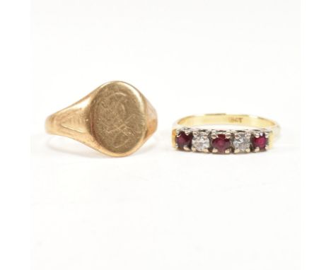 An 18ct gold ruby and diamond five stone ring. The ring set with two round brilliant cut diamonds and three mixed cut rubies 