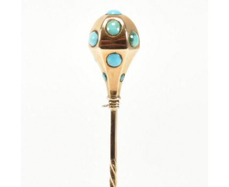 A late 19th century gold and turquoise stick pin. The stick pin having a domed head set with graduating turquoise cabochons t