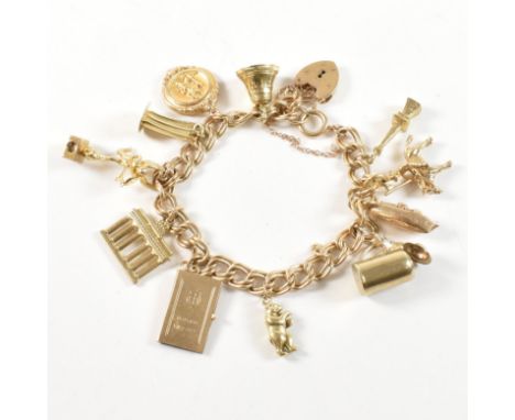 A gold charm bracelet. The bracelet having 11 mixed carat gold charms strung on a 9ct curb chain with a hallmarked 9ct gold h