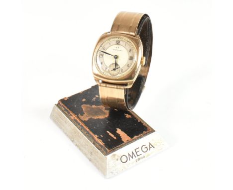 Vintage Omega 9ct gold gentleman's wristwatch set to a 9ct gold hallmarked bangle / bracelet strap. The dial with Arabic numb