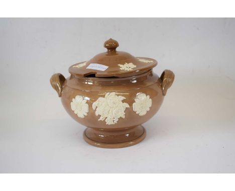 Continental pottery jar and cover, the light buff ground with white slip decoration of flowers, 17cm diam