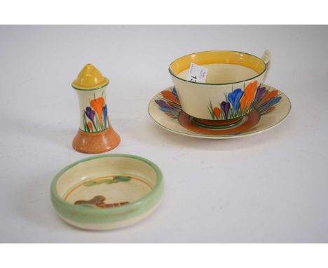 A Clarice Cliff crocus pattern cup and saucer together with a pepper pot and secrets pattern pin dish (4)pepper pot 9cm high 