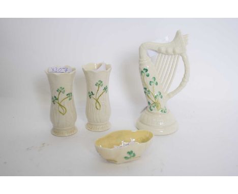 Quantity of mid-20th century Belleek wares including model of an Irish harp, two vases and a small bowl, all with shamrock de