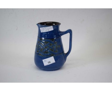 Barnstaple Pottery blue glazed jug with Art Deco motif decoration in green, 17cm high
