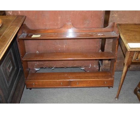 Early 20th century mahogany open wall shelf with two base drawers, 91cm wide