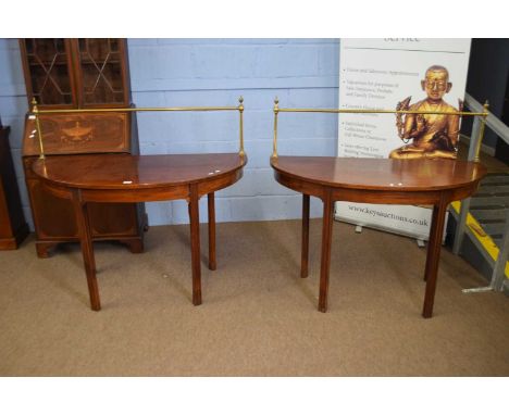 Pair of 19th century mahogany D-shaped console tables with brass railed backs, 121cm wide (2)