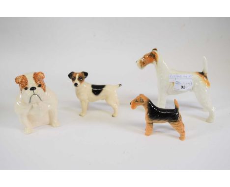 A Beswick model of a terrier Travera Romulus, a further terrier, model of a bulldog and model of a smooth haired fox terrier 