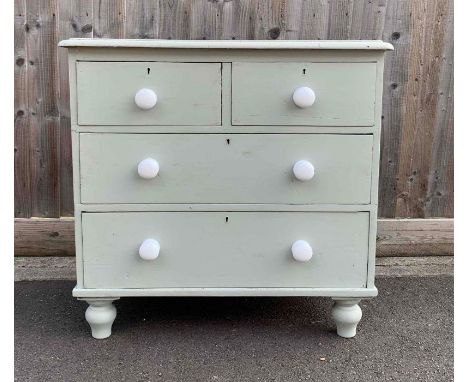 A Victorian painted pine chest of two short and three long drawers with ceramic handles and turned feet, 82cm wide, 80cm high