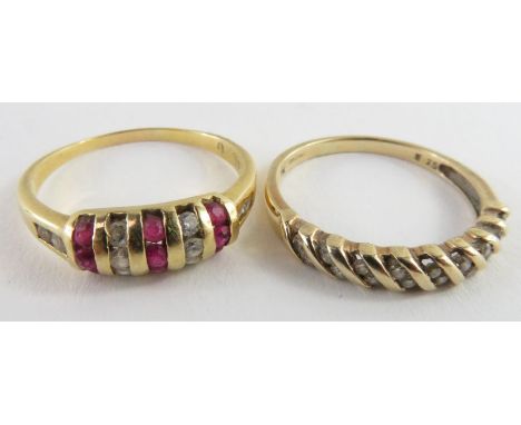 A 9ct gold diamond dress ring, finger size Q 1/2, 2.37g gross; and a ruby and diamond dress ring marked '750', finger size S,