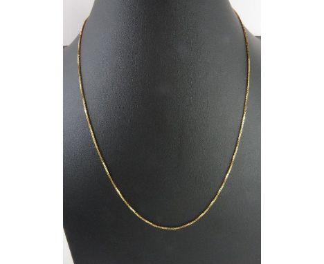 A fine box link chain, marked '750', 50cm long, 3.94g gross