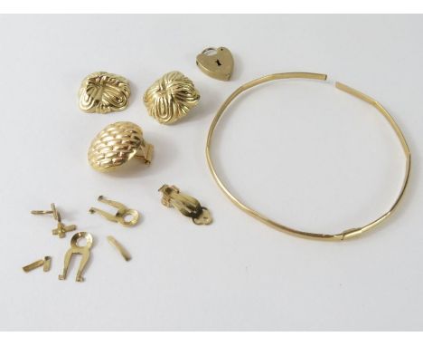 A 9ct gold heart shaped padlock, 1.66g gross; a broken hollow bangle stamped '14k', 2.09g gross; together with various broken