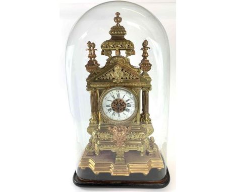Late 19th/early 20th century large brass cased two train French mantel clock. Standing on a gilded wooden base inside the ori