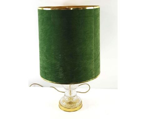 A 20th century cut glass and etched bulbous table lamp, with a circular gilt metal base, having a green shade 