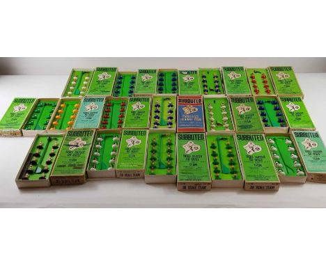 A collection of boxed Subbuteo teams to include Brazil and Cameroon, together with various other Subbuteo related items