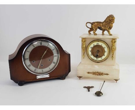 A 20th century marble mantel clock with gilt metal lion finial, along with a mahogany cased mantel clock ##keys##
